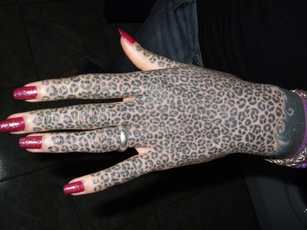 Tiger fur hand | Best tattoo design ideas | Leopard print tattoos, Stripe  tattoo, Tiger fur